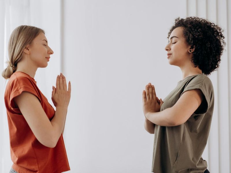 Person practicing eye exercises in a well-lit living room.